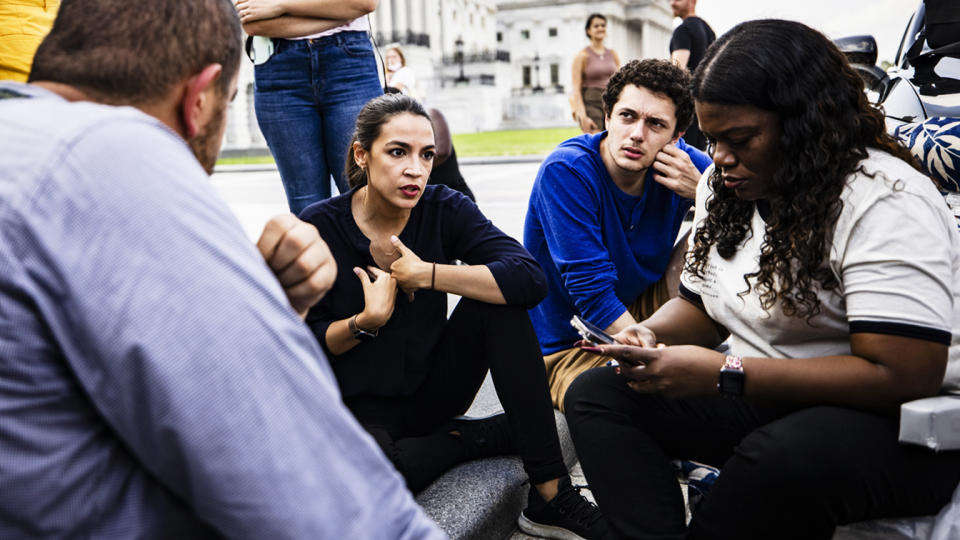 U.S. Representatives Alexandria Ocasio-Cortez (D-NY) (C) and Cori Bush (D-MO) (R) continue their protest for an extension of the eviction moratorium on the steps to the House of Representatives at the U.S. Capitol Building on August 1, 2021 in Washington, DC. (Samuel Corum/Getty Images)