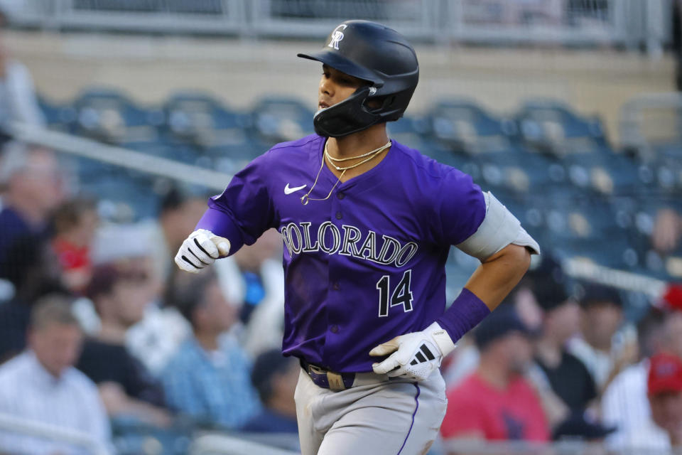 Colorado Rockies' Ezequiel Tovar runs the bases on a three-run home run against the Minnesota Twins during the sixth inning of a baseball game Tuesday, June 11, 2024, in Minneapolis. (AP Photo/Bruce Kluckhohn)