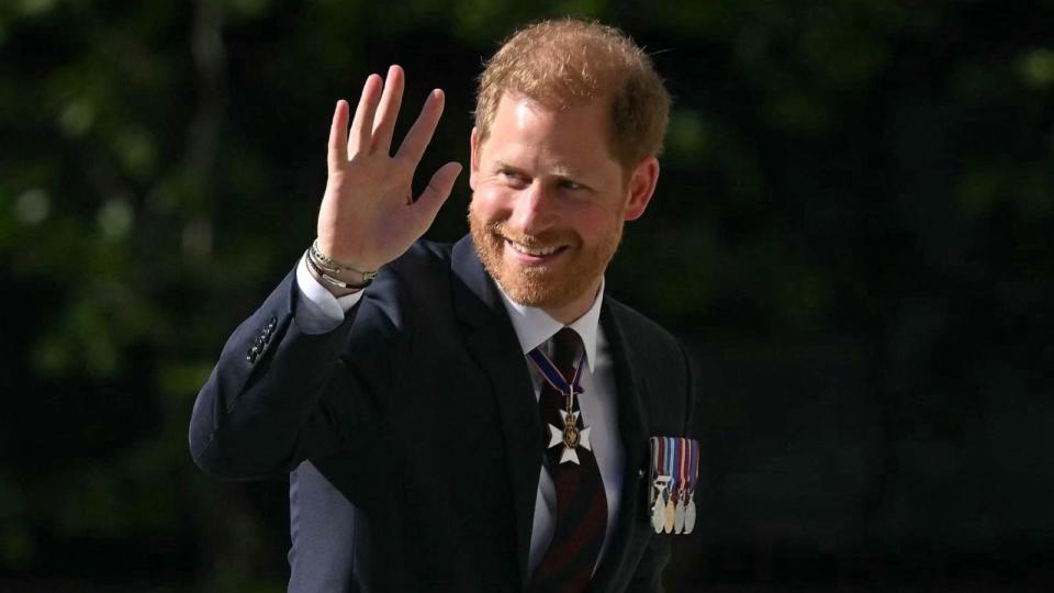 PHOTO: Britain's Prince Harry, Duke of Sussex waves as he arrives to attend a ceremony marking the 10th anniversary of the Invictus Games, at St. Paul's Cathedral, May 8, 2024, in London. (Justin Tallis/AFP via Getty Images)