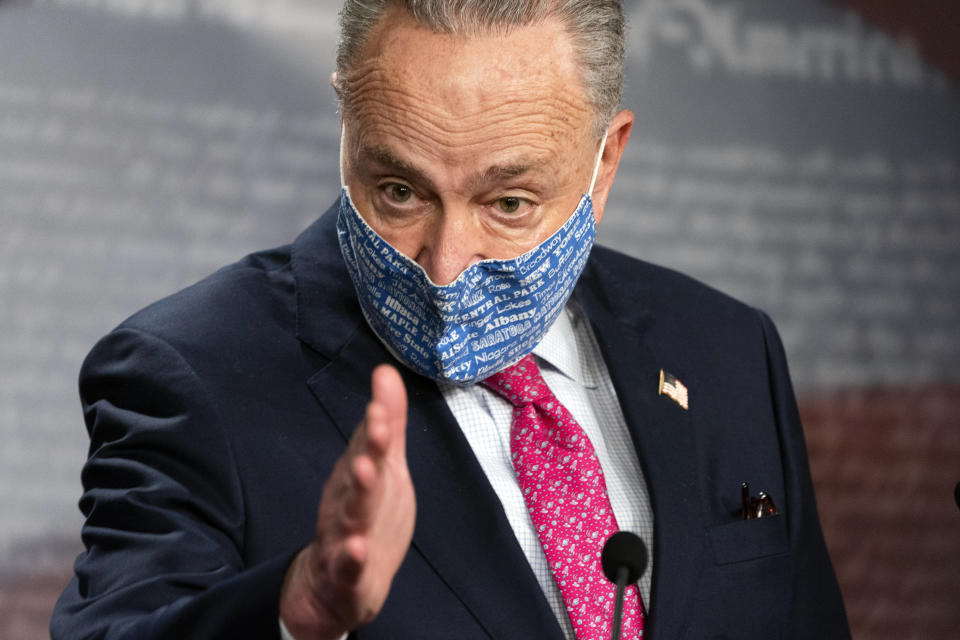 Senate Majority Leader Chuck Schumer of N.Y., center, speaks during a news conference with Sen. Debbie Stabenow, D-Mich., left, and Sen. Patty Murray, D-Wash., Tuesday, Jan. 26, 2021, on Capitol Hill in Washington. (AP Photo/Jacquelyn Martin)