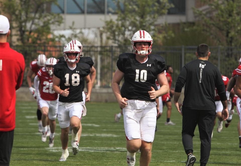Tyler Van Dyke (10) and Braedyn Locke (18) will be vying for the No. 1 quarterback job in fall camp.