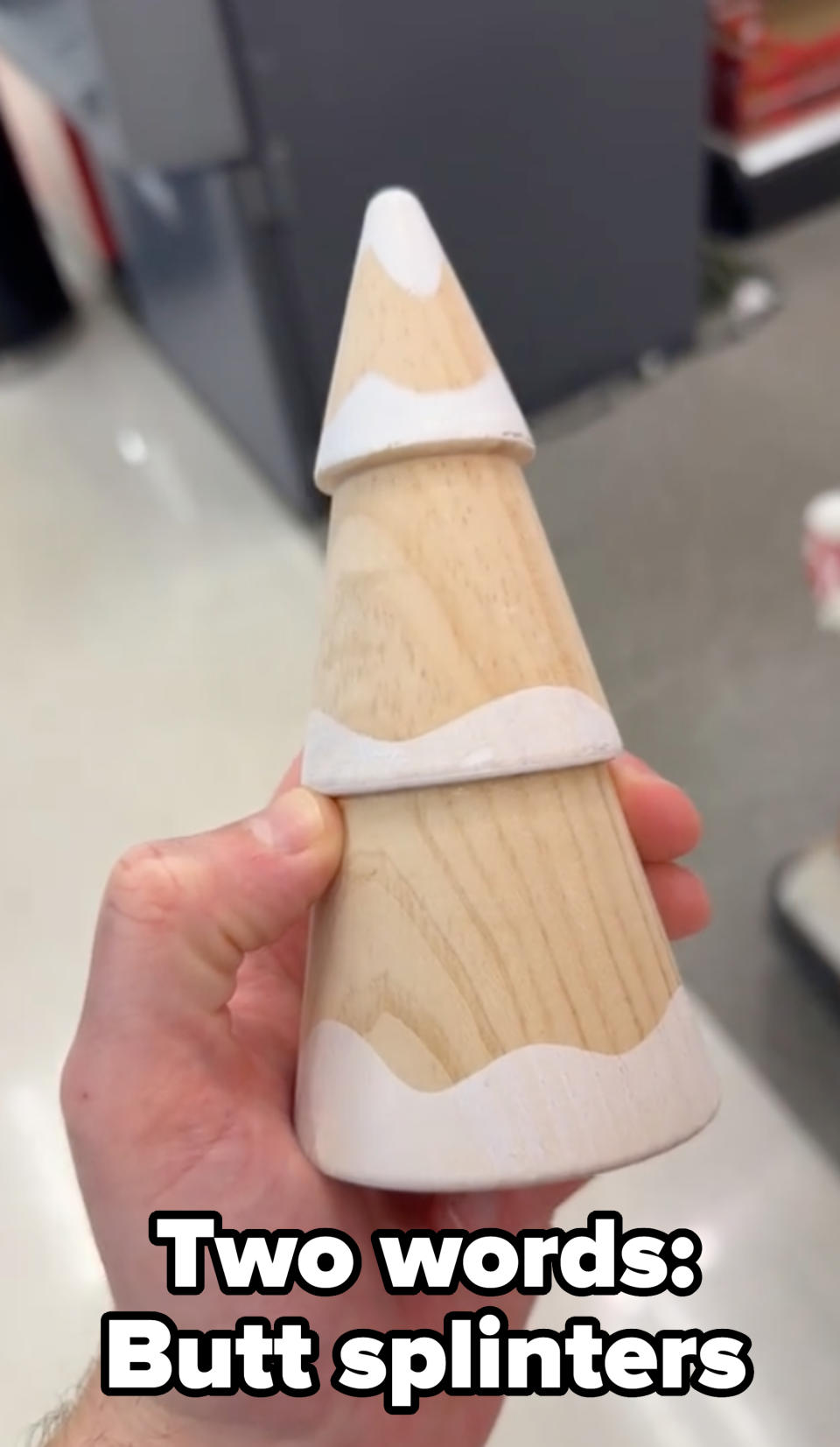 A wooden tree ornament with caption "Two words: Butt splinters"
