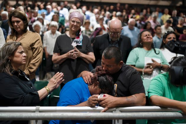 Two family members of one of the victims killed in Tuesday's shooting at Robb Elementary School comfort each other during a prayer vigil on Wednesday. (Photo: Jae C. Hong/Associated Press)