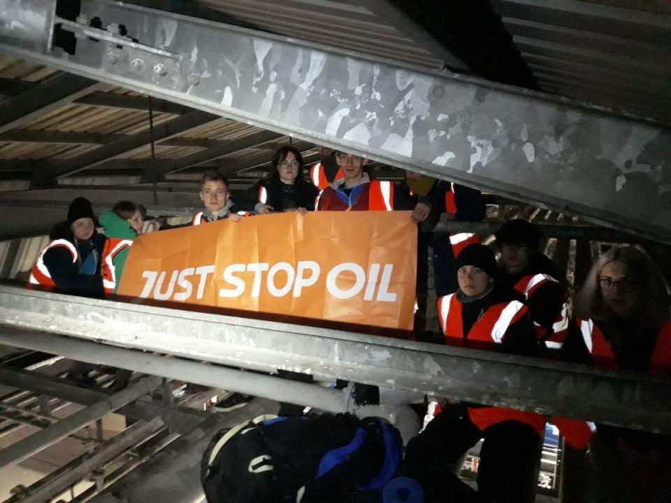 Just Stop Oil supporters photographed at the Glasgow oil terminal during one of their protests (Just Stop Oil)