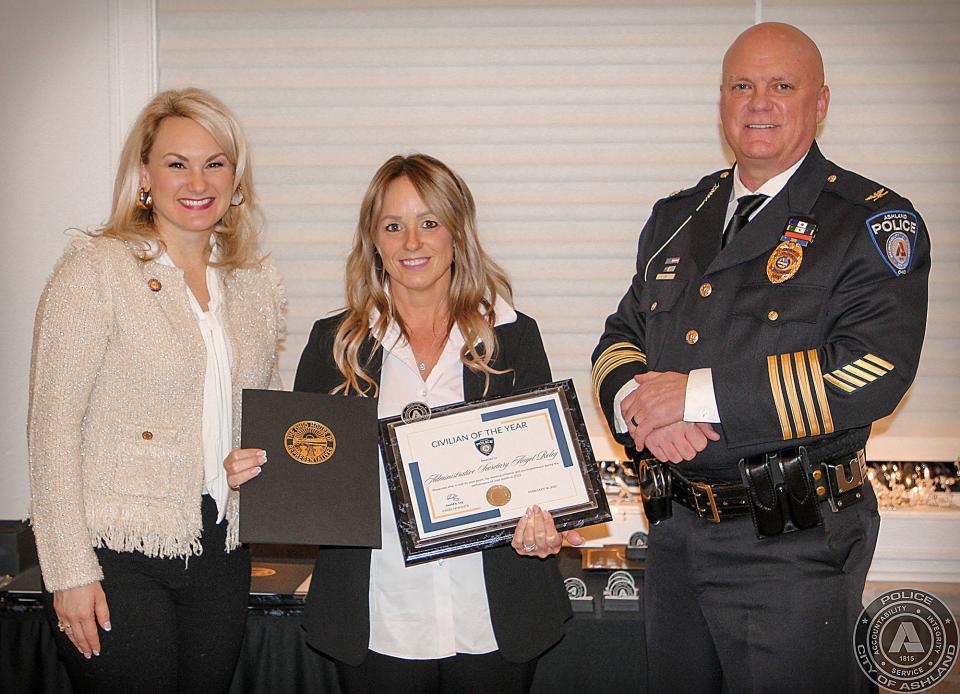 2022 Civilian of the Year L to R; State Rep. Melanie Miller, Administrative Secretary Angel Roley, Chief David Lay