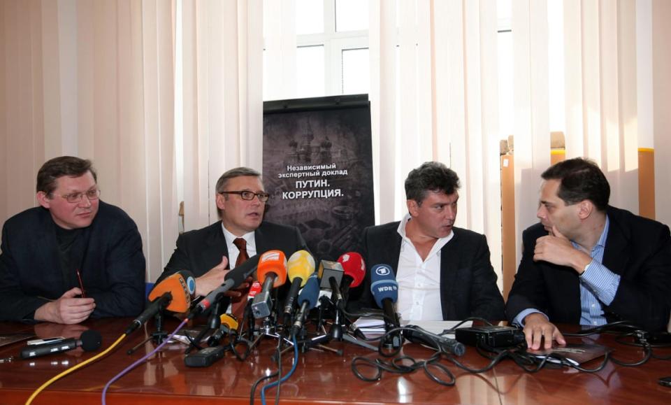 <div class="inline-image__caption"><p>People’s Freedom Party, (L-R) Vladimir Ryzhkov, Mikhail Kasyanov, Boris Nemtsov, and Vladimir Milov, speak to the media in Moscow on March 28, 2011.</p></div> <div class="inline-image__credit">Alexey Sazonov/AFP via Getty</div>