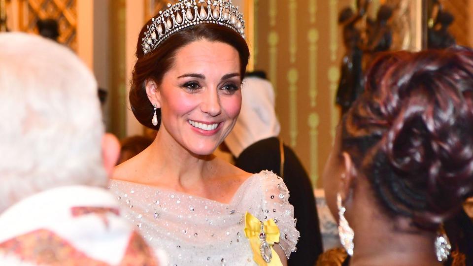 The Princess of Wales in a pearl tiara and white dress