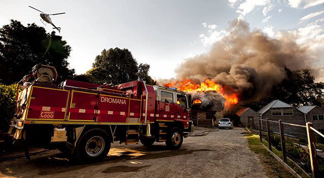 Firefighters tackle blaze which detsroyed a cafe in the grounds of a historic homestead at Dromana. Photo: Facebook