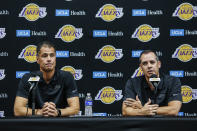 Los Angeles Lakers general manager Rob Pelinka, left, and head Coach Frank Vogel speak during the NBA basketball team's media day in El Segundo, Calif., Friday, Sept. 27, 2019. (AP Photo/Ringo H.W. Chiu)