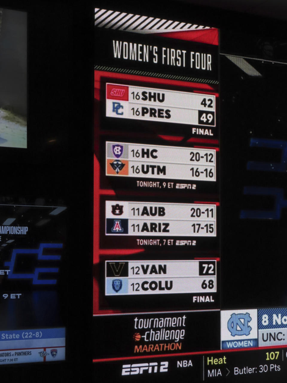 NCAA basketball tournament brackets are displayed on video screens at the Golden Nugget casino in Atlantic City N.J. on Wednesday, March 21, 2024. The American Gaming Association estimates Americans will wager $2.72 billion with legal outlets this year. (AP Photo/Wayne Parry)