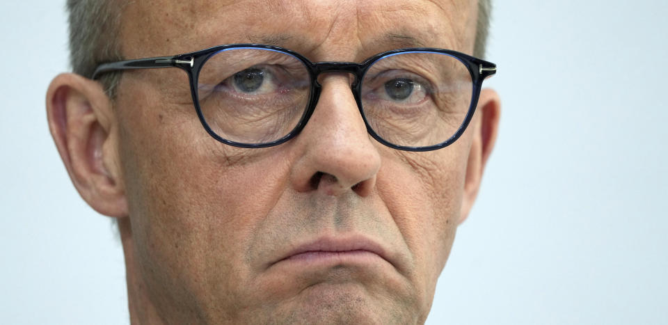 FILE - The Chairman of the German Christian Democratic Party (CDU), Friedrich Merz, addresses the media during a press conference at the party's headquarters in Berlin, Germany, Monday, May 9, 2022. Germany's conservative opposition leader said Tuesday that large-scale migration is one of the country's biggest problems and one of the main reasons for the recent surge in support for the far right. (AP Photo/Michael Sohn, File)