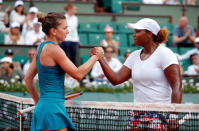 Tennis - French Open - Roland Garros, Paris, France - May 31, 2018 Romania's Simona Halep shakes hands with Taylor Townsend of the U.S. after winning their second round match REUTERS/Charles Platiau