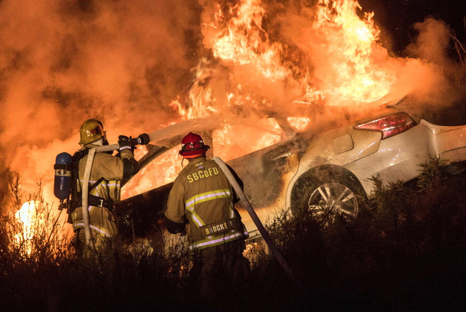 <p>A suspect who shot a Huntington Beach Police officer during a pursuit died after losing control of his vehicle on northbound Interstate 15 freeway at Cleghorn Road, San Bernardino County, Calif. on Aug. 26, 2016. (Photo: Kevin Warn via ZUMA Wire) </p>