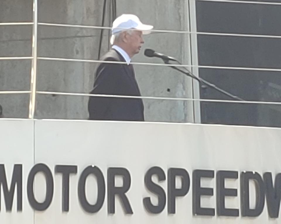 Roger Penske giving the starting command from Victory Circle.