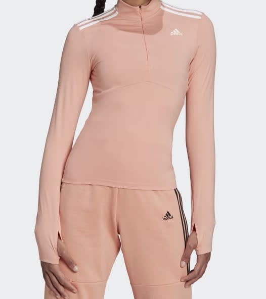 Pink quarter-zip top