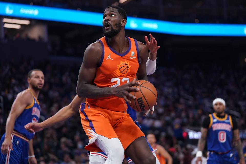 Dec 3, 2021; San Francisco, California, USA; Phoenix Suns center Deandre Ayton (22) spins towards the hoop against the Golden State Warriors in the second quarter at the Chase Center. Mandatory Credit: Cary Edmondson-USA TODAY Sports