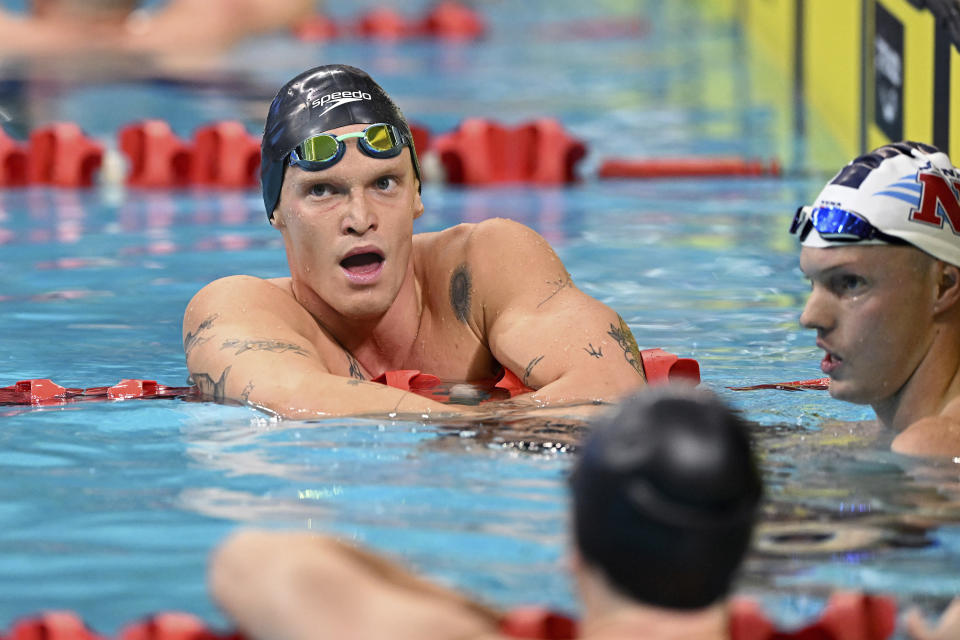 Cody Simpson recovers after his men's 100m butterfly heat at the Australian swimming championships in Adelaide, Wednesday, May 18, 2022. Taking time out from his singing career to focus on swimming has started to pay off for Simpson, who was selected in the Commonwealth Games swim team after placing third in the 100-meter butterfly event at the Australian trials. (Dave Hunt/AAP Image via AP)