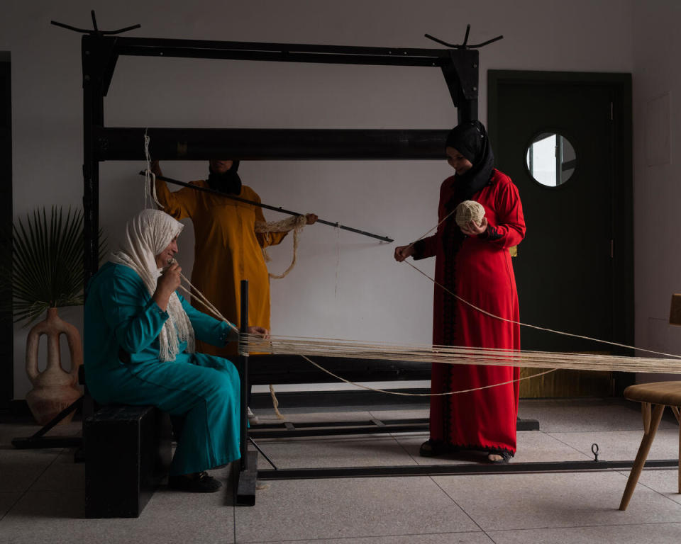 Weavers working in Beni Rugs’ new studio in Marrakech