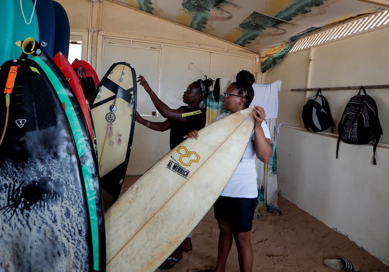 Wider Image: Meet Senegal's first female pro surfer inspiring girls to take to the waves