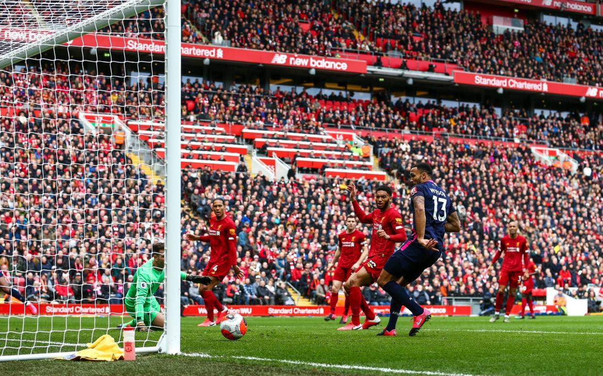 Callum Wilson of Bournemouth scores a goal to make it 0-1 during the Premier League match between Liverpool FC and AFC Bournemouth at Anfield on March 7, 2020 in Liverpool, United Kingdom - Getty Images Europe