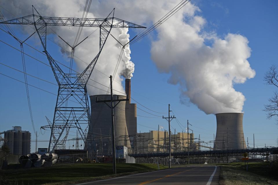 Smoke and steam is emitted from the James M. Gavin Power Plant in Cheshire, Ohio.