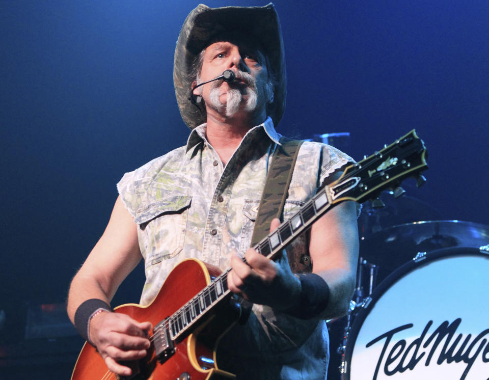 FILE - Ted Nugent performs at Rams Head Live in Baltimore on Aug. 16, 2013. Nugent revealed he was in agony after testing positive for coronavirus — months after he said the virus was “not a real pandemic.” "I thought I was dying," Nugent says in a Facebook live video posted Monday. (Photo by Owen Sweeney/Invision/AP, File)