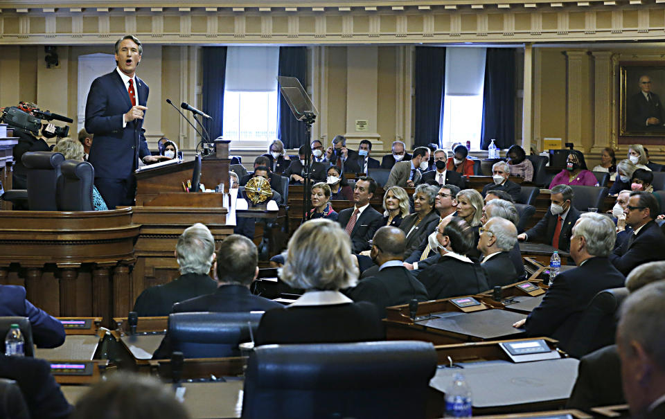 Gov. Glenn Youngkin gives his State of the Commonwealth speech to the Joint Assembly inside the House of Delegates Chamber at the State Capitol in Richmond, Va., Monday, Jan. 17, 2022. (Bob Brown/Richmond Times-Dispatch via AP)