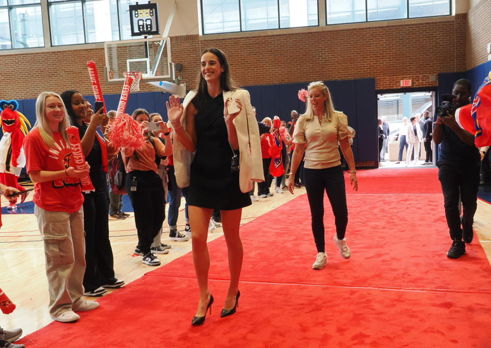 INDIANAPOLIS, IN – APRIL 17: Indiana Fever's Caitlin Clark and Christie Sides arrive at Gainbridge Fieldhouse ahead of Clark's introductory press conference at Gainbridge Fieldhouse on April 17, 2024 in Indianapolis, Indiana.  NOTE TO USER: By downloading and/or using this Photo, User expressly acknowledges and agrees to accept the terms and conditions of the Getty Images License Agreement.  Mandatory Copyright Notice: Copyright 2024 NBAE (Photo: Ron Hoskins/NBAE via Getty Images)