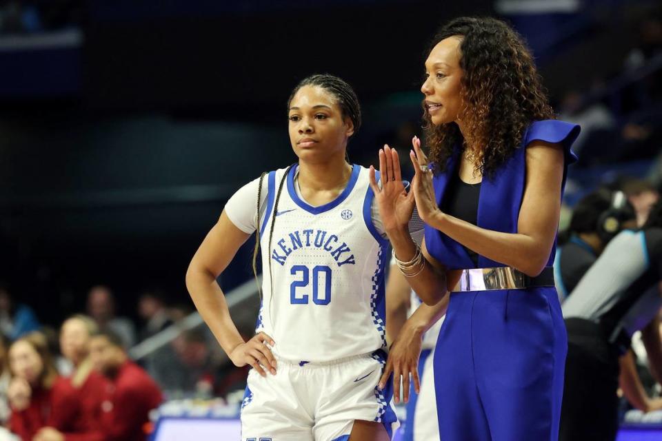 Kentucky head coach Kyra Elzy offered instruction to sophomore Amiya Jenkins during a game this season. Elzy said inexperience was partly to blame for this season's struggles. "We had 10 players who had to step up in new roles. ... I told the players in the locker room, ‘Not a lot of players could withstand what we have dealt with this year."