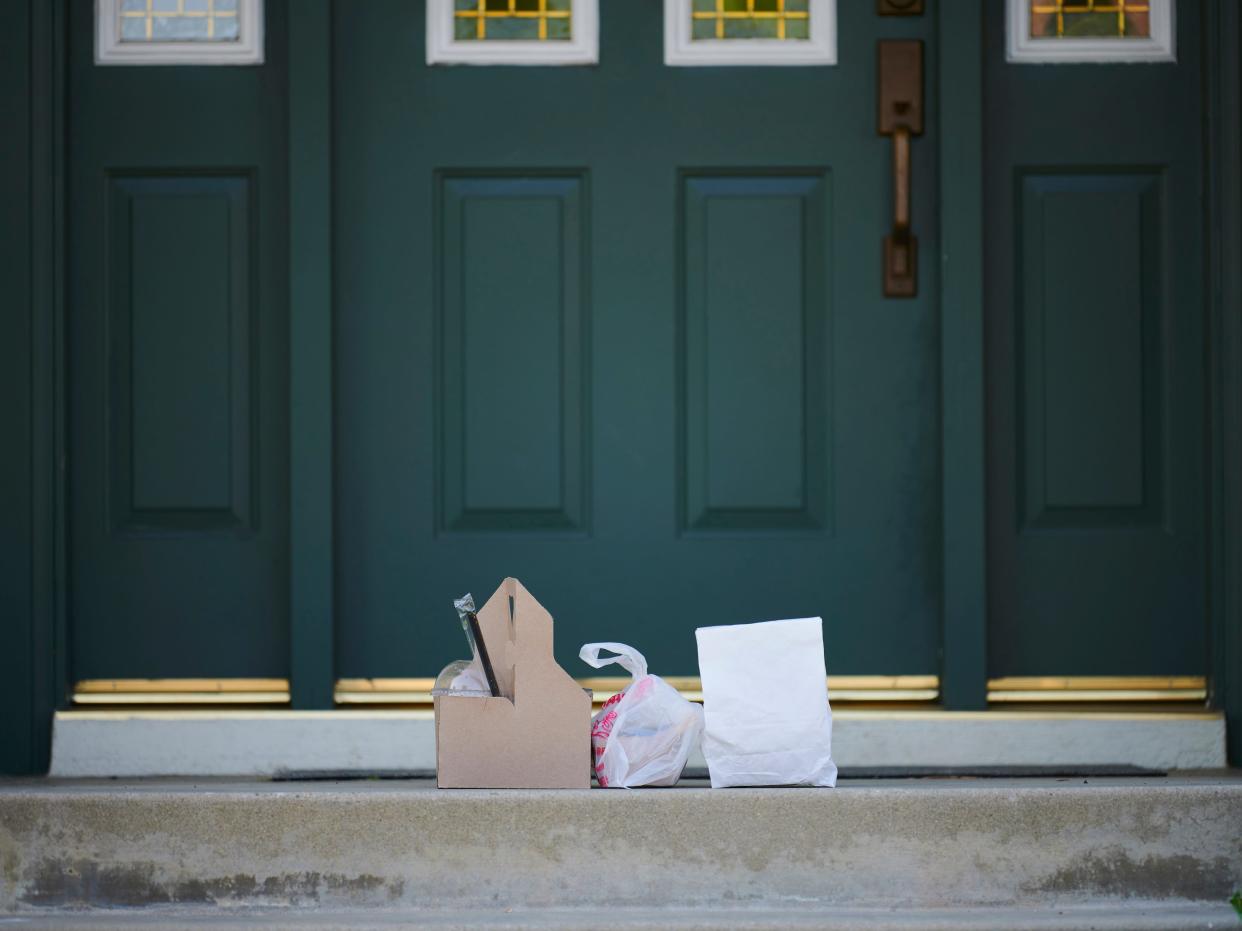 A picture of food parcels left on a doorstep.