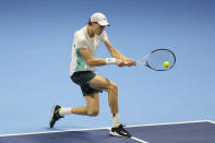 Italy's Jannik Sinner reacts during the singles tennis match against Serbia's Novak Djokovic, of the ATP World Tour Finals at the Pala Alpitour, in Turin, Italy, Tuesday, Nov. 14, 2023. (AP Photo/Antonio Calanni)