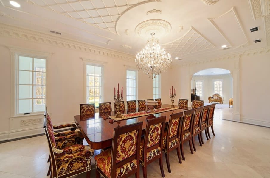 An American 'palace' with a pool at its heart dining room