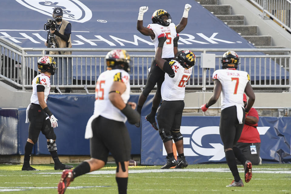 Maryland wide receiver Rakim Jarrett (5) celebrates his first-quarter touchdown pass against Penn State during an NCAA college football game in State College, Pa., Saturday, Nov. 7, 2020. (AP Photo/Barry Reeger)