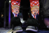 <p>Millie March, 12, of Fairfax, Va., wears socks featuring President Donald Trump while awaiting his speech to the Conservative Political Action Conference (CPAC), at National Harbor, Md., Friday, Feb. 23, 2018. (Photo: Jacquelyn Martin/AP) </p>