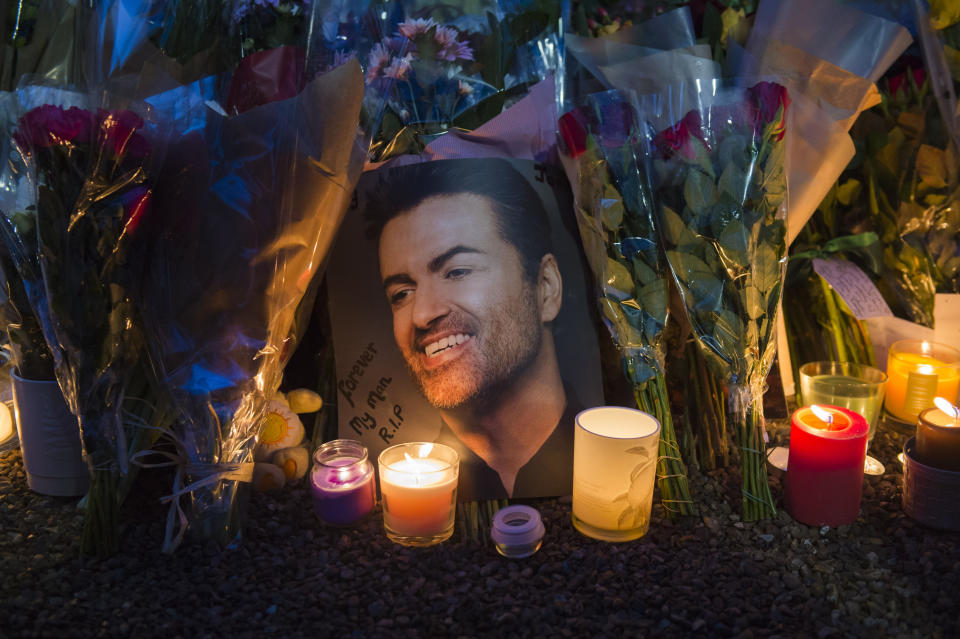 Tributes outside George Michael's house in Highgate, North London, UK, following the singer's death.