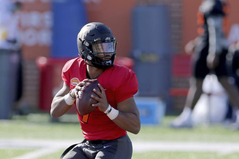 Quarterback Jamie Newman of Wake Forest (7) had an up-and-down week at the Senior Bowl. (AP Photo/Rusty Costanza)