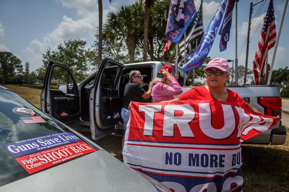 Lucia Zappitelli, Canton, Ohio, waits to see former President Donald Trump leave Trump International Golf Club in unincorporated Palm Beach County, Fla, on April 2, 2023.