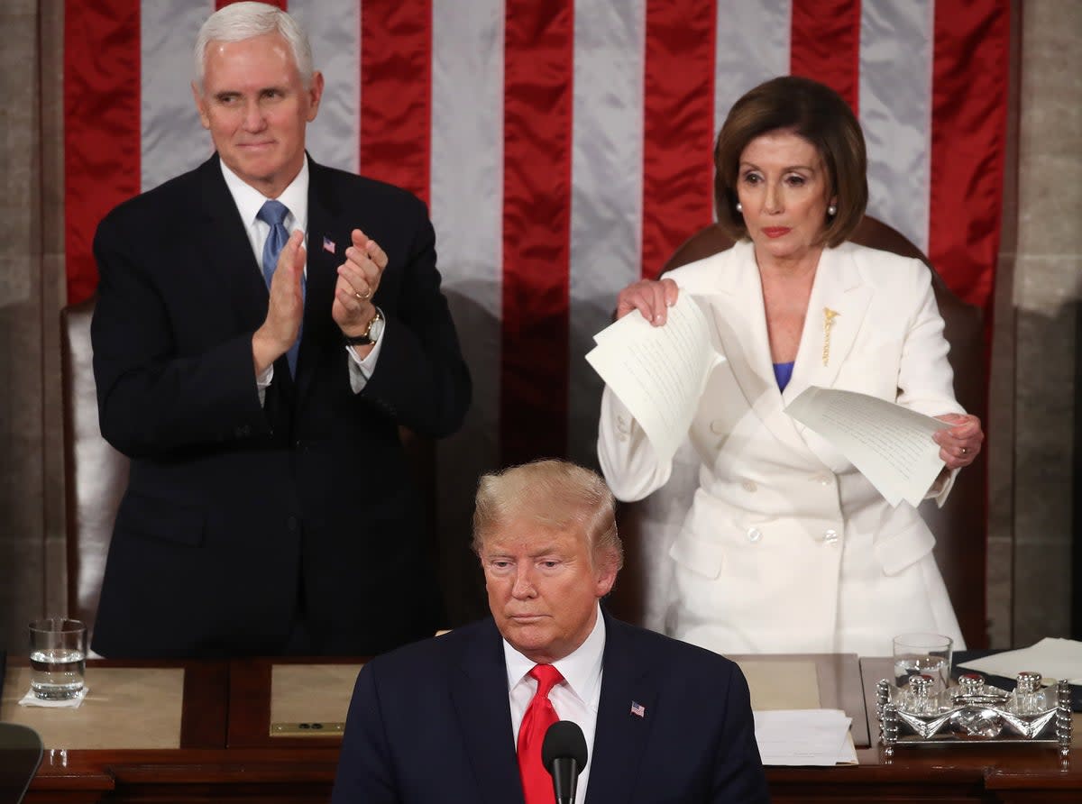 House Speaker Rep. Nancy Pelosi (D-CA) rips up pages of the State of the Union speech after then-President Donald Trump finishes his State of the Union speech in the chamber of the U.S. House of Representatives in 2020 Pelosi writes in a new memoir that medical professional shared their concern with her in 2019 that Trump’s mental health ‘was in decline’ (Getty Images)