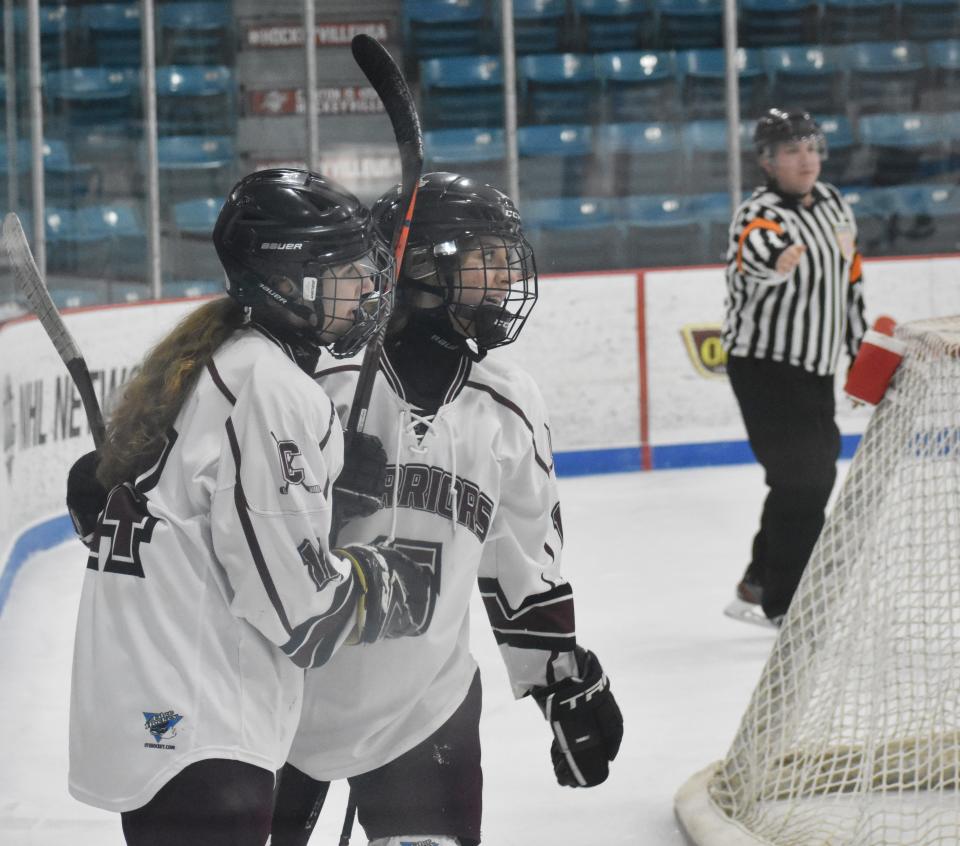 Clinton players celebrate a first-period goal against Oswego on Wednesday. Jan. 19, 2022.