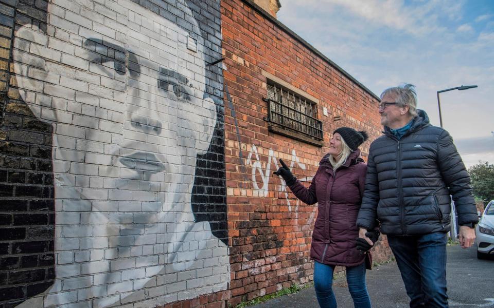 Janice and Mike McGreevy with the mural of local boy Phil Foden in Stockport - Paul Cooper