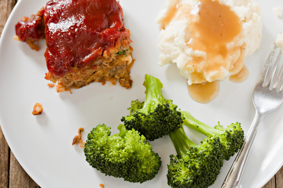 Meatloaf with mashed potatoes and broccoli.