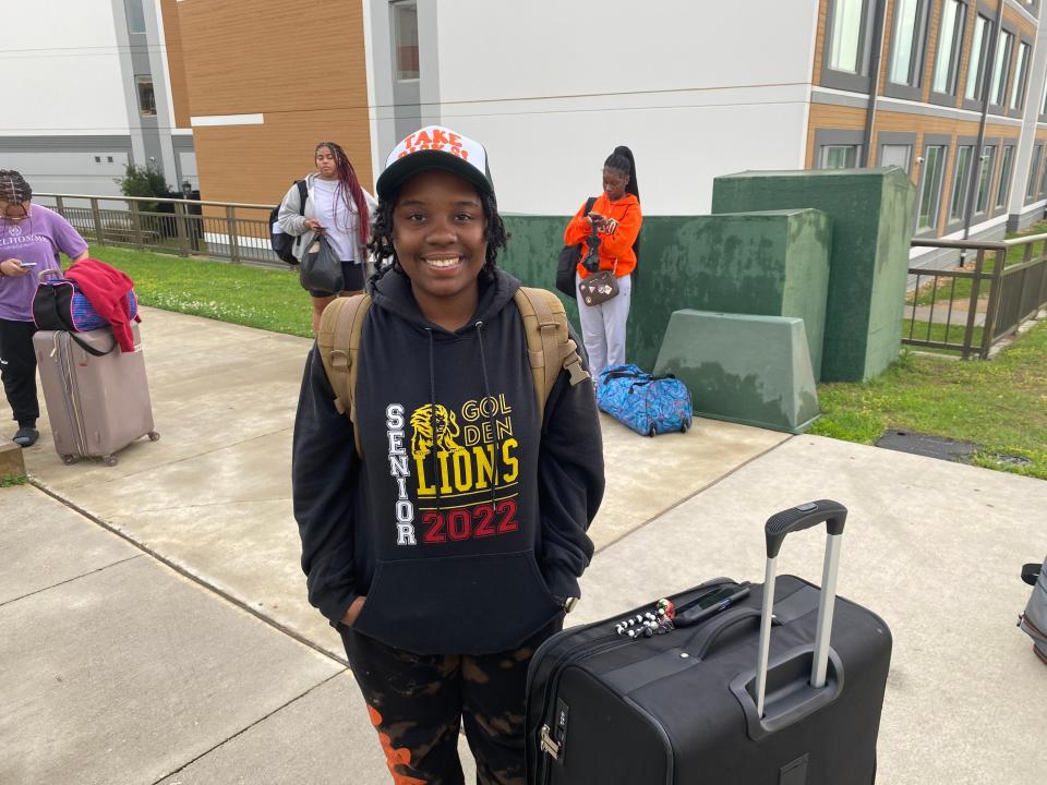 FAMU sophomore C.J. Mitchells stands in front of FAMU Towers as she gets ready to head home for spring break.