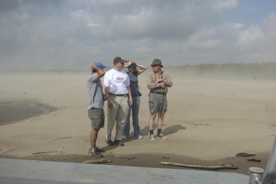 In this 2007 photo provided by the U.S. Army Corps of Engineers, researchers look for interior least terns during a survey of the lower Mississippi River. Once hurt the by the damning of major rivers like the Missouri and before that diminished by hunting for feathers for hats, the interior tern population has increased tenfold in population since 1985 to more than 18,000. On Wednesday, Oct. 23, 2019, the U.S. Fish and Wildlife Service will propose taking the interior population of the least tern off the endangered list. (USACE, Memphis District via AP)