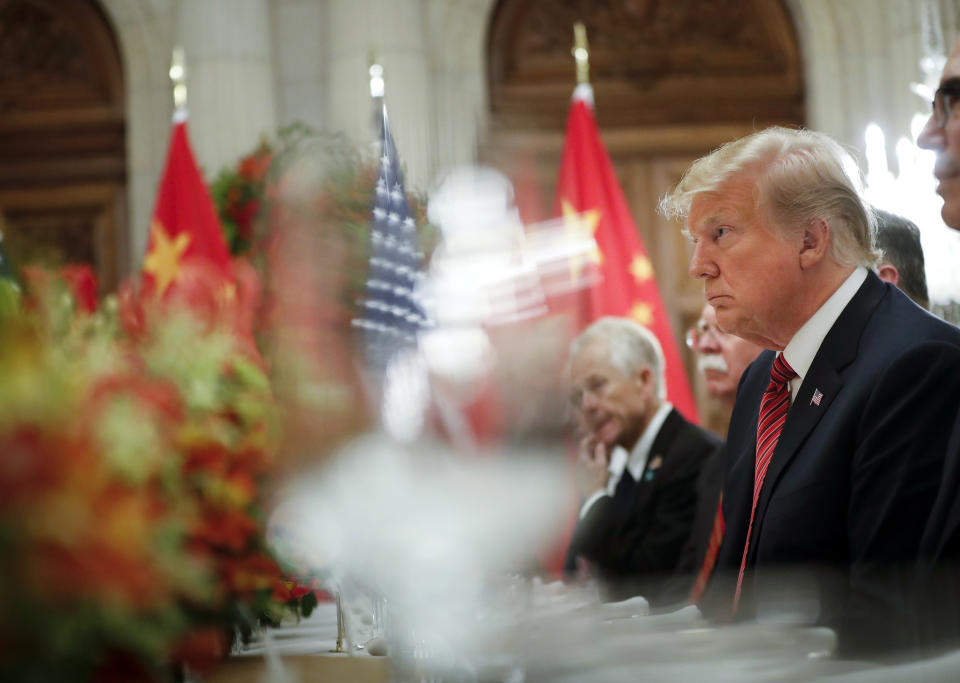 FILE - In this Dec. 1, 2018, file photo President Donald Trump listens to China's President Xi Jinping speak during their bilateral meeting at the G20 Summit in Buenos Aires, Argentina. Trump meets with President Xi Jinping at the G-20 meeting in Japan this week. (AP Photo/Pablo Martinez Monsivais, File)
