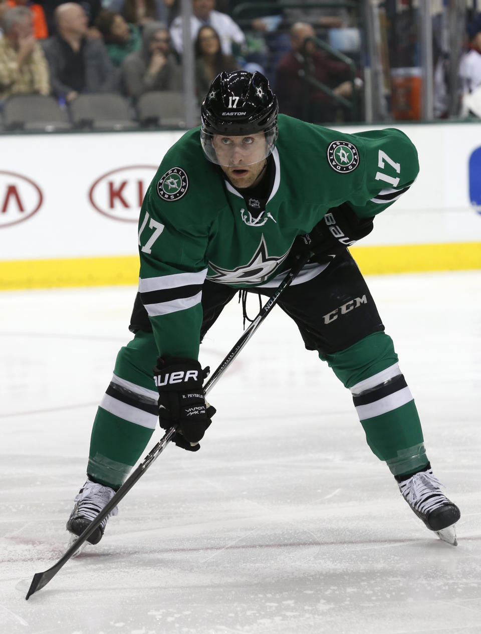 Dallas Stars center Rich Peverly lines up for a face-off in the first period of an NHL Hockey game against the Columbus Blue Jackets Monday, March 10, 2014, in Dallas. He was taken to the hospital after medical emergency with 13:37 left in the first period. (AP Photo/Sharon Ellman)