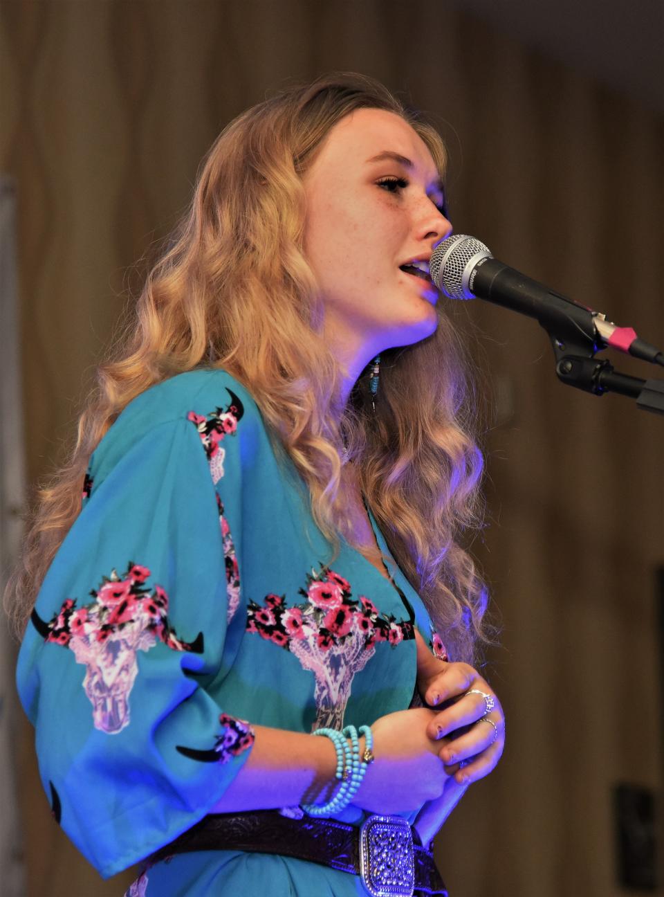 Songwriter-guitarist Winter Mills, who plays under the stage moniker Winter Dawn, sings at Bastrop’s Sizzling Summer concert series.