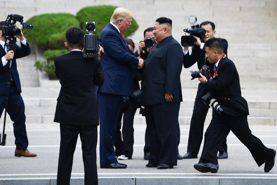 North Korean leader Kim Jong Un welcomes President Donald Trump at the Demilitarized Zone on June 30, 2019.