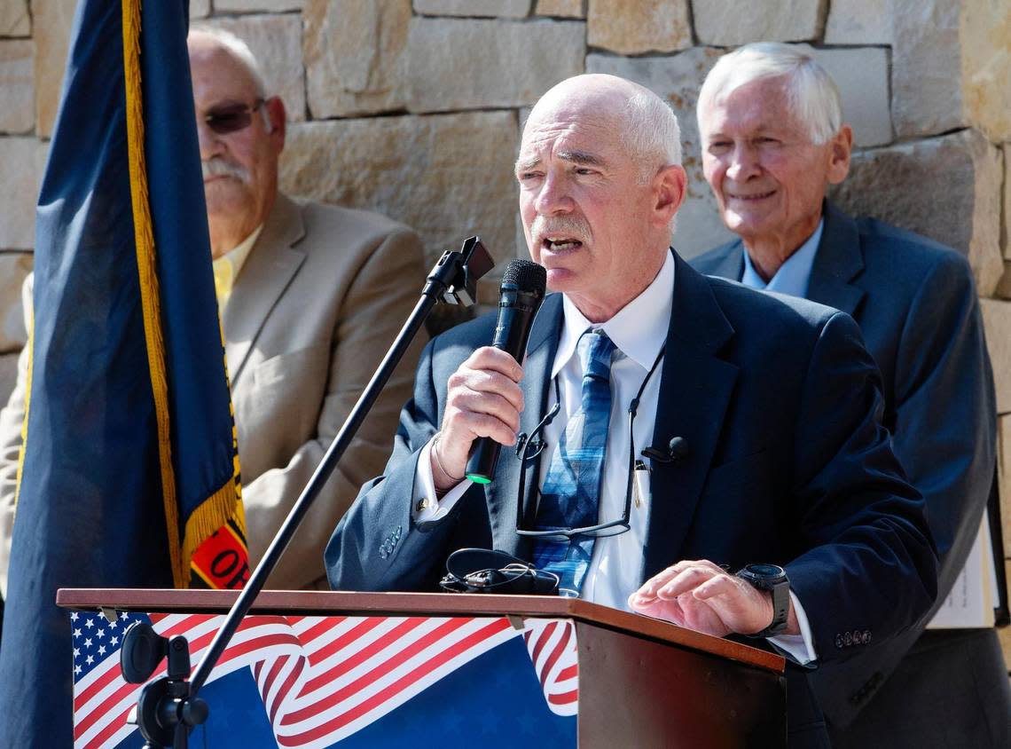 Tom Arkoosh, Democratic candidate for Idaho Attorney General, announces his state campaign chairs during a press conference at the Anne Frank Memorial in Boise on Aug. 9, 2022.