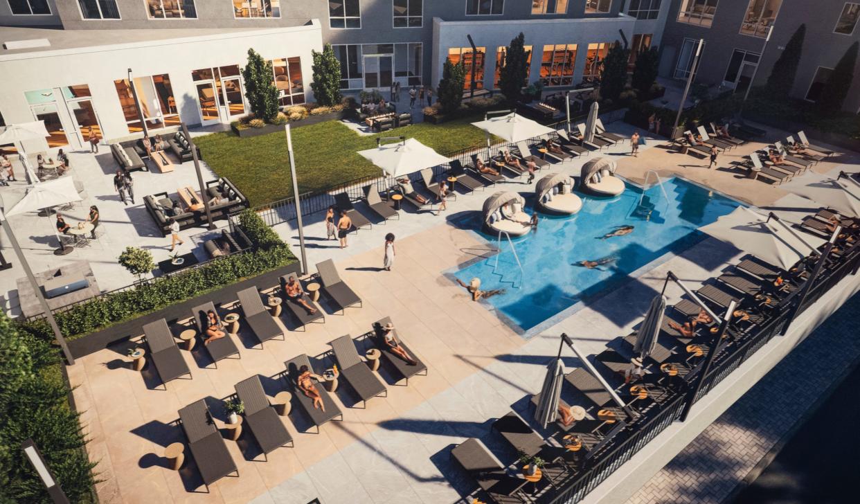 A rendering of the pool and courtyard area is shown during a ribbon-cutting event for the newly completed Perennial Corktown upscale housing development in Corktown on Thursday, Jan. 11, 2024.