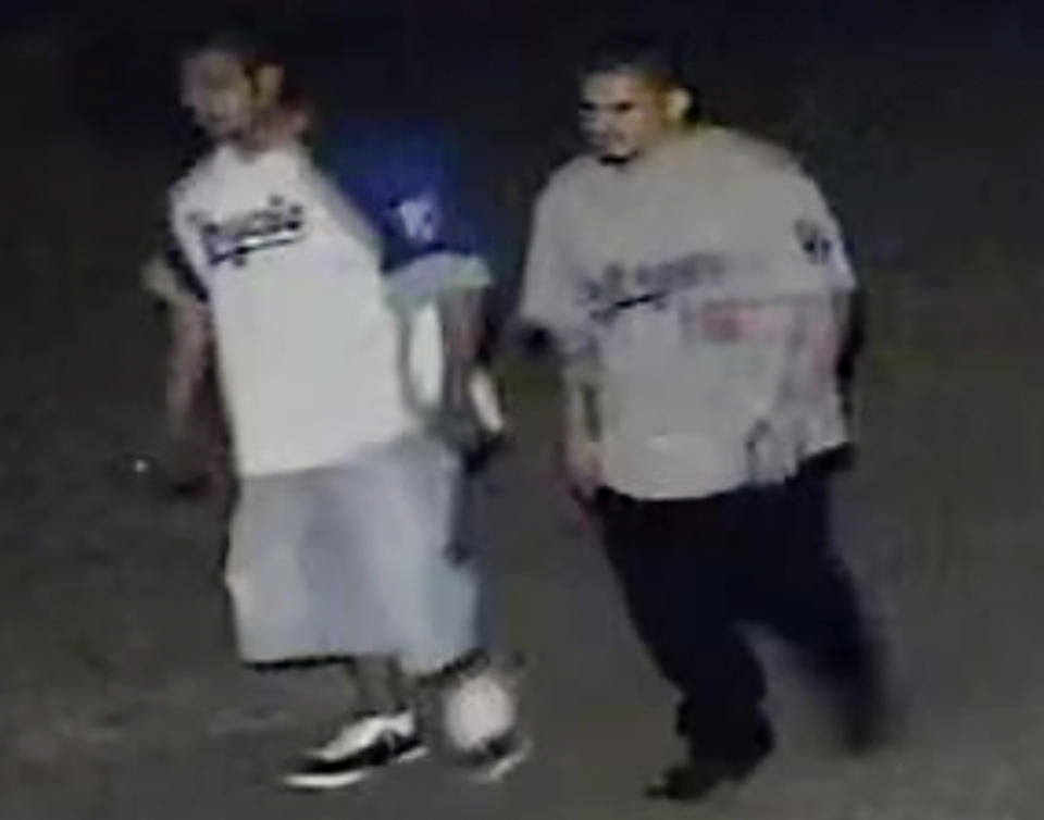 This frame grab from surveillance video provided by the Kansas City, Kan. Police Department shows two suspects authorities are looking for in connection with a fatal shooting at a bar early Sunday, Oct. 6, 2019, in Kansas City. (Courtesy of Kansas City, Kan. Police Department via AP)